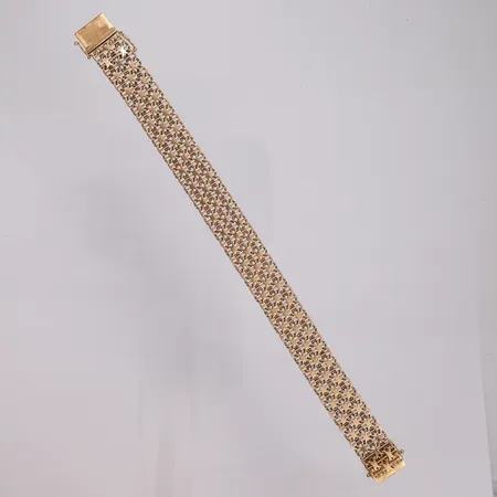 Armbånd X med stav, lengde 21cm, bredde 14mm, 18K, Utstilt på Grønland Vekt: 28,5 g Kontakt Lånekontoret for frakt