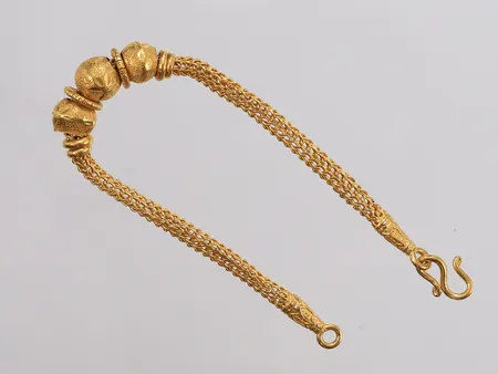 Armbånd, lengde 17cm, bredde 3-9mm, 22K Vekt: 15,1 g Kontakt Lånekontoret for frakt