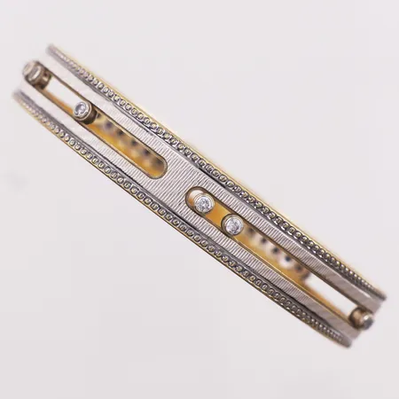Armring, med blanke stener, ø 57,5mm, bredde 9,8mm, 22K Vekt: 28,9 g Kontakt Lånekontoret for frakt