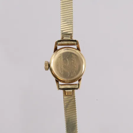 Certina gullur, ø17mm, manuell, bredde på rem 5,7mm, inngravering på klokkens bakside, urverket går, 14K i urkasse og lenke (OBS! Lenkelås er doublé), bruttovekt 22,7g Kontakt Lånekontoret for frakt