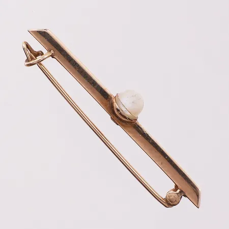 Slipsnål med hvit sten, lengde 4cm, bredde 6,4mm, 14K Vekt: 2 g Kontakt Lånekontoret for frakt