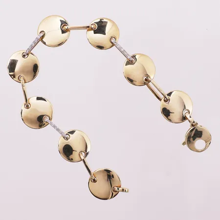Armbånd med blanke stener, lengde 19,5cm, bredde 1,4 - 14,2mm, 14K Vekt: 13,4 g Kontakt Lånekontoret for frakt