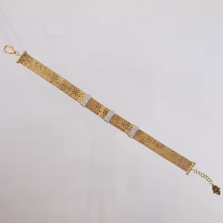 Armbånd med hvite glass steiner, lengde ca 18,5cm, bredde 9mm, 18K. Vekt: 12,7 g Kontakt Lånekontoret for frakt