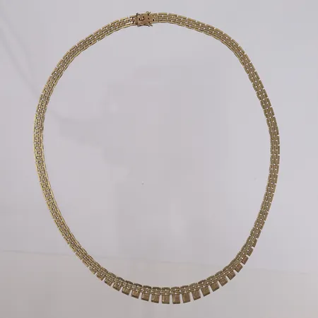 Kjede Mursten, gradert, lengde 41,5cm, bredde 4,7- 8,7mm, 14K Vekt: 27,1 g Kontakt Lånekontoret for frakt