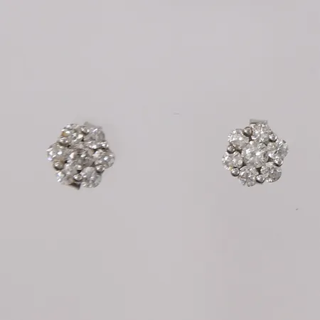 Ett par øredobber med diamanter (2 x ca. 0,05ct og 12 x ca. 0,02ct), ø5mm, 14K Vekt: 0,9 g Kontakt Lånekontoret for frakt