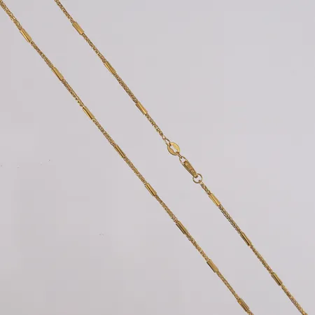 Kjede, lengde 50cm, bredde 0,8mm, 22K Vekt: 5,1 g Kontakt Lånekontoret for frakt