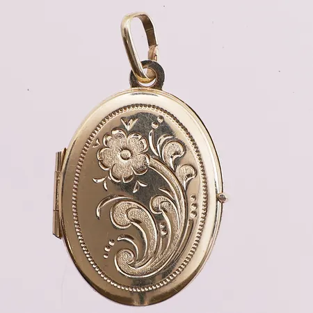 Medaljong, lengde 21,6mm, bredde 17mm, liten bulk, 14K Vekt: 2,5 g Kontakt Lånekontoret for frakt