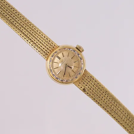 Omega gull-armbåndsur med gull-lenke, lengde 17cm, skade på lenke, flekker på urskive, går ikke, 18K, bruttovekt 31,9g Vekt: 0 g Kontakt Lånekontoret for frakt