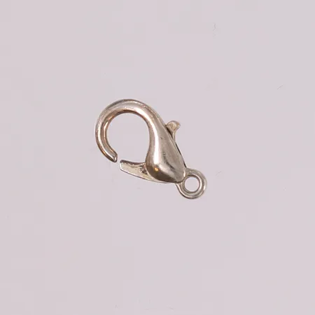 Smykkelås i kobber og sink (OBS! IKKE gull eller sølv), 12x7mm Vekt: 0 g Kontakt Lånekontoret for frakt
