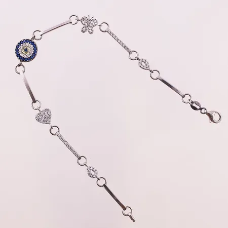 Armbånd med klare, blå og gule stener, lengde 19,5cm, bredde 1cm, 14K Vekt: 4,6 g Kontakt Lånekontoret for frakt