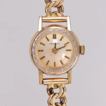 Armbåndsur gull med Bismarck gull-lenke, Certina, manuell, lengde 17,5cm, bredde 4-19mm, baklokk i metall, ikke funksjonstestet, 14K, bruttovekt 17,9g Kontakt Lånekontoret for frakt