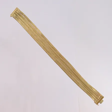 Armbånd, lengde 19,5 cm, bredde 14,8 mm, noe defekt mønster, 14K. Vekt: 35,6 g Kontakt Lånekontoret for frakt
