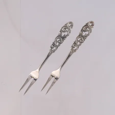 2 sitrongafler Telesølv, lengde 10,2cm, 830S Vekt: 15,1 g Kontakt Lånekontoret for frakt