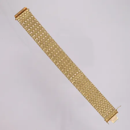 Armbånd, lengde 19cm, bredde 21mm, 18K Vekt: 56,3 g Kontakt Lånekontoret for frakt