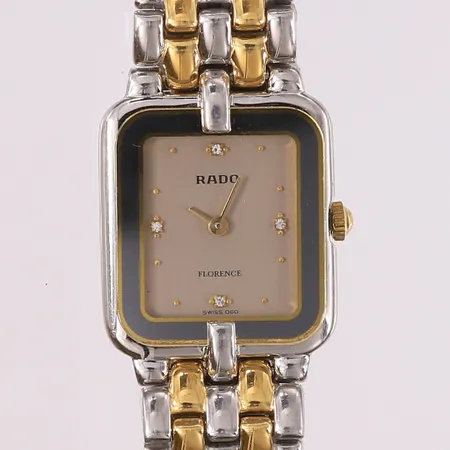 Rado Florence Swiss 060, quartz, stål (og gulfarge på lenke), snr: 37104516, 24x21mm, lenkelengde ca. 14cm, uten boks og tilbehør Kontakt Lånekontoret for frakt