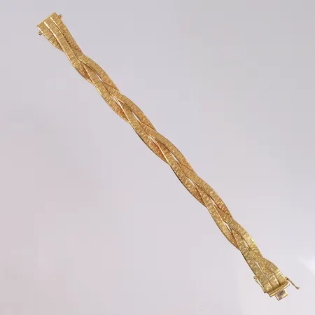 Armbånd, lengde 19cm, bredde 8,7- 9,8mm, 18K Vekt: 34,3 g Kontakt Lånekontoret for frakt