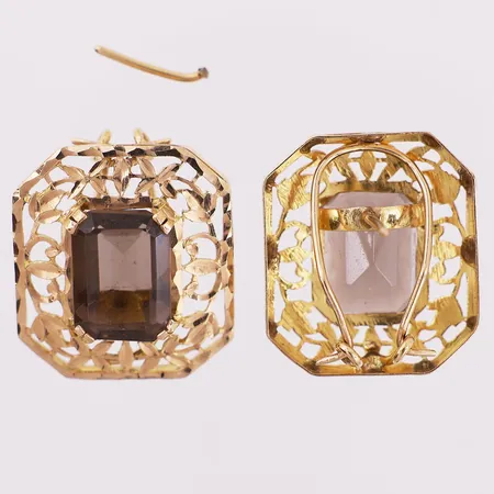Ett par øredobber med brune stener, 30x26mm (en stiften i knekt av) 18K Vekt: 18,4 g Kontakt Lånekontoret for frakt