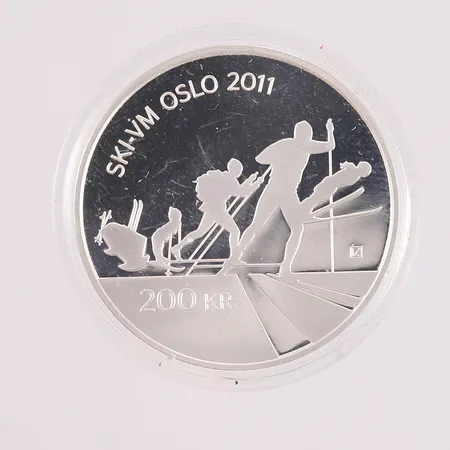 Sølvmynt Ski-VM Oslo 2011 Kr 200,- Vekt: 16,9 g Kontakt Lånekontoret for frakt