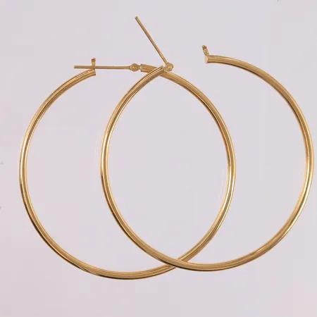 Ett par øreringer, ø51mm, bredde 2mm, 18K Vekt: 3 g Kontakt Lånekontoret for frakt