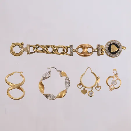 Skrotgull 18K. Vekt: 28,7 g Kontakt Lånekontoret for frakt