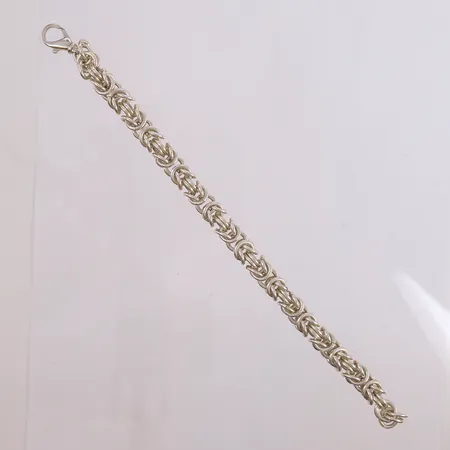 Kongearmbånd i sølv 925/1000 21 cm.  Vekt: 50,9 g Kontakt Lånekontoret for frakt