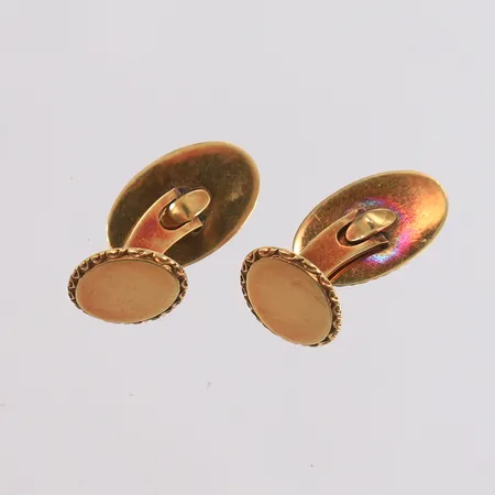 Ett par mansjettknapper, 14x19mm, 14K.  Vekt: 9,5 g Kontakt Lånekontoret for frakt