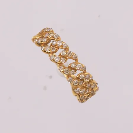 Ring med 54 diamanter (totalt 0,50ct iht. gravering), ø16,7mm, bredde 1,2- 5,7mm, 18K Vekt: 1,7 g Kontakt Lånekontoret for frakt