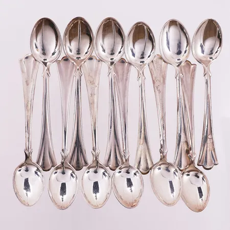 Tolv teskjeer, Lilje, lengde 11,7 cm, bredde 24,5 mm, 830S Vekt: 159,5 g Kontakt Lånekontoret for frakt