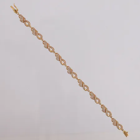 Armbånd med blanke stener, lengde 17cm, bredde 0,8- 5,9mm, 21K, bruttovekt 7,7g Vekt: 0 g Kontakt Lånekontoret for frakt