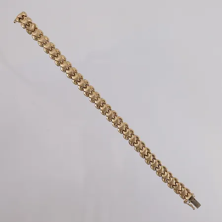 Armbånd, lengde 18,5cm, bredde 8,7mm, låsen er gravert med "Asil", 14K Vekt: 13,1 g Kontakt Lånekontoret for frakt