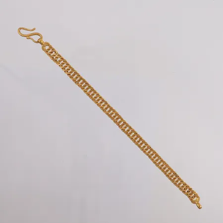 Armbånd, lengde 18,5cm, bredde 7,3mm, 23K, thai-gull, vekt tilsvarer 1,5 baht Vekt: 22,9 g Kontakt Lånekontoret for frakt