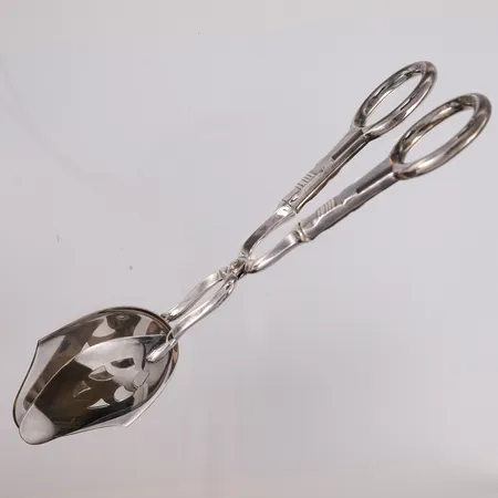 Smørbrødklype Bankett, lengde 20,4cm, de ytterste delene er sølvplett 60g, 830S, bruttovekt 100,5g Kontakt Lånekontoret for frakt