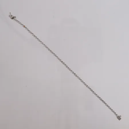 Tennisarmbånd med diamanter (63 x ca. 0,02ct), lengde 17,5cm, bredde 2,6mm, én sten mangler, hvitt gull, 18K, bruttovekt 9,9g Vekt: 0 g Kontakt Lånekontoret for frakt