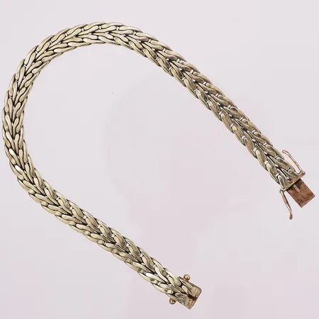 Armbånd, lengde 21 cm, bredde 6,6 mm, 14K Vekt: 25,4 g Kontakt Lånekontoret for frakt