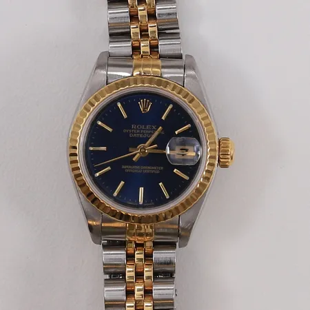 Dameur Rolex Datejust, stål/gull, automatisk, ø25mm, ref. 79173, snr: K459659, blå urskive, safirglass, dato, med boks og garantikort (kjøpt Urmaker Bjerke 06.04.2002)  Kontakt Lånekontoret for frakt