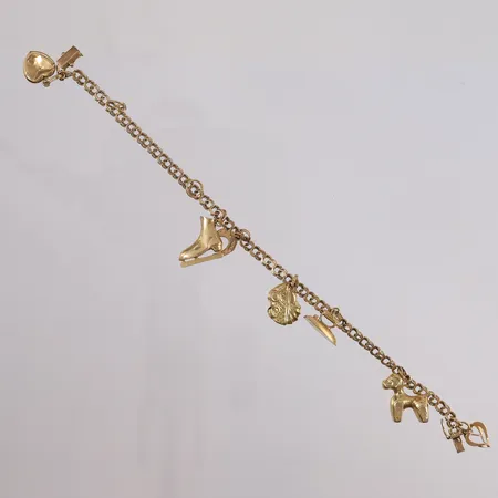 Armbånd Bismarck med 7 charms, lengde 20,5cm, bredde 4,1- 27mm, 14K Vekt: 11,1 g Kontakt Lånekontoret for frakt