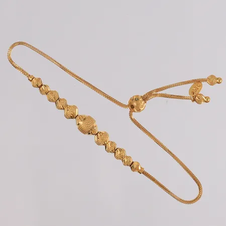 Armbånd, lengde ca. 18cm, bredde 1,1- 6,2mm, 21K Vekt: 5,7 g Kontakt Lånekontoret for frakt