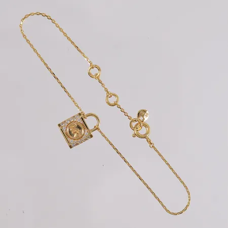 Armbånd Michael Kors, modell MKC1631AN710, gulmetall.  Kontakt Lånekontoret for frakt