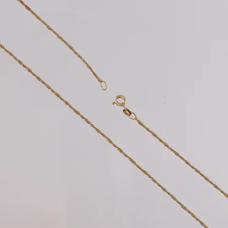 Halskjede, lengde ca 53cm, bredde ca 1mm, noe slitt lenke, italienske stempler, 18K gull.  Vekt: 3,5 g Kontakt Lånekontoret for frakt