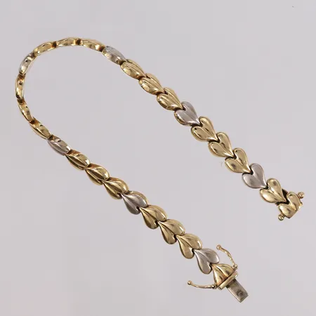 Armbånd, lengde ca 19cm, bredde ca 7mm, tofarget hvitt gull/gult gull, 14K.  Vekt: 11,2 g Kontakt Lånekontoret for frakt