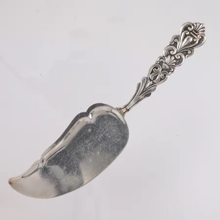 Kakespade, lengde ca 21cm, sølvplett 40 gr.  Vekt: 50,4 g Kontakt Lånekontoret for frakt