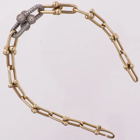 Armbånd med klare stener, lengde 20,5 cm, bredde 12,2 mm, mangler stempel, 18K Vekt: 11,6 g Kontakt Lånekontoret for frakt