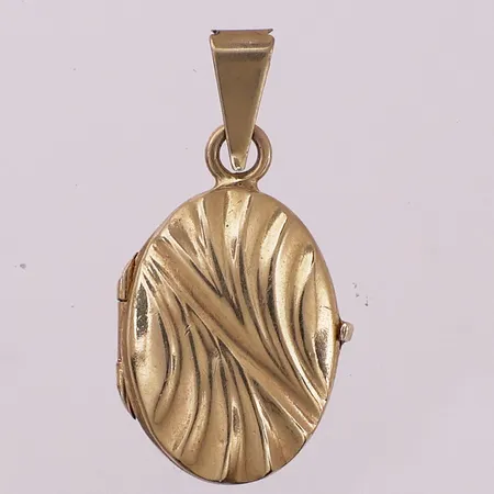 Medaljong, lengde 30,8 mm, bredde 5,1 mm, 14K Vekt: 3,9 g Kontakt Lånekontoret for frakt