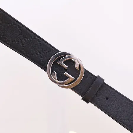 Lærbelte Gucci med monogram, sort utside og brunt innside, størrelse 90-34mm, modell 743030, variant CW-CWN, 2 beltestropper sort og brun, yttertrekk, boks, bånd Vekt: 0 g Kontakt Lånekontoret for frakt