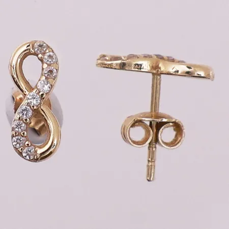 Ett par øredobber med klare stener, lengde 1,2 cm, bredde 11,4 mm, mangler stempel, 14K Vekt: 1,1 g Kontakt Lånekontoret for frakt