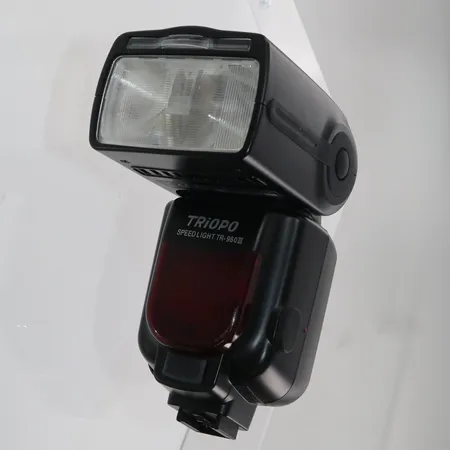Blitz, Triopo Speedlight TR-960 II, snr. 139115423, ikke funksjonstestet, med softbag Kontakt Lånekontoret for frakt