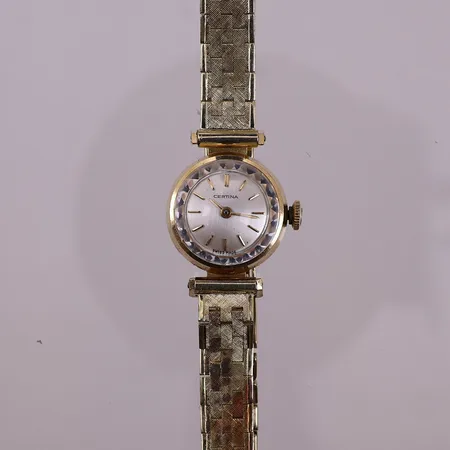 Klokke Certina i gull, serienr 200927, refnr 0810103, caliber 13-20, manuell, urkasse i 18K, lenke i 14K, trenger service, bruttovekt 23,9g Kontakt Lånekontoret for frakt