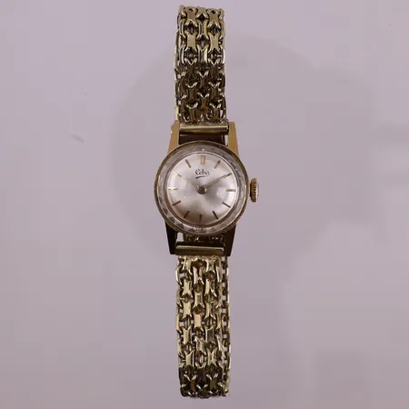 Klokke Cebo i gull, serienr 867039, modell 351, caliber 067, år trolig 1995, urkasse i 18K, x-lenke i 14K, bruttovekt 27,1g Kontakt Lånekontoret for frakt