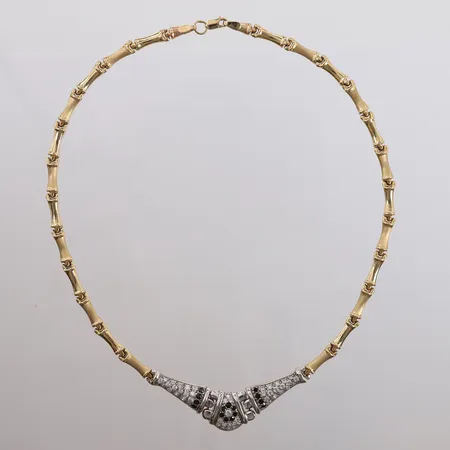 Halssmykke med blanke og sorte stener, to-farget, lengde 39,5cm, bredde 3- 14,3mm, 14K, bruttovekt 15,9g Vekt: 0 g Kontakt Lånekontoret for frakt