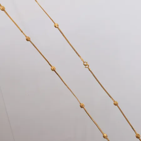 Halssmykke med kuler, lengde 60cm, bredde 1,5- 5,1mm, 22K Vekt: 12,3 g Kontakt Lånekontoret for frakt